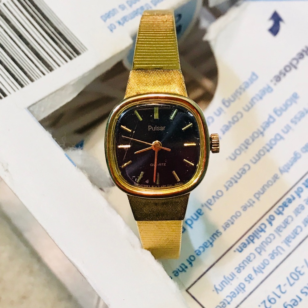 Gold stainless petite watch